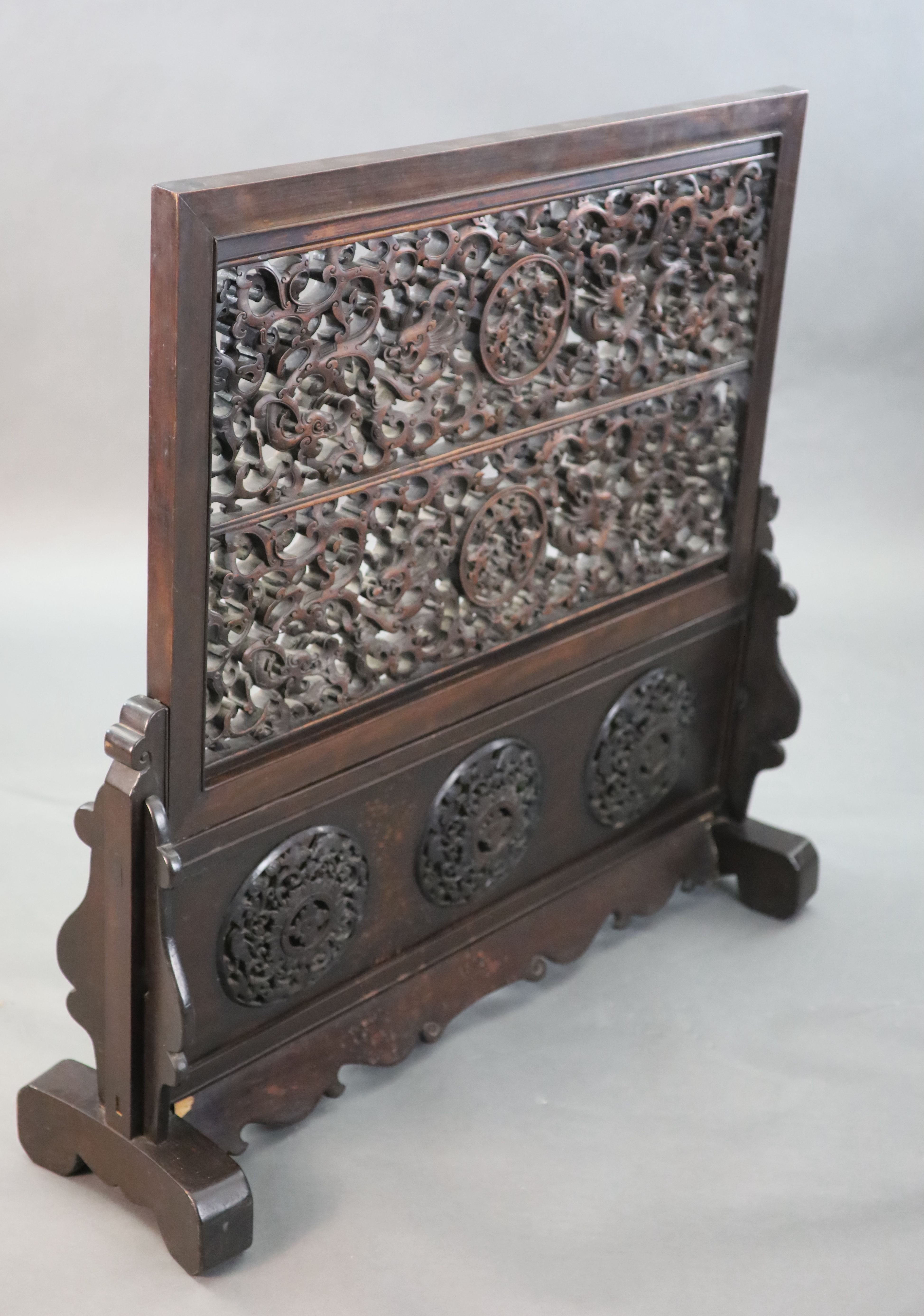 A large Chinese hardwood table screen, c.1910, 93.5cm high, 93.5cm wide, Provenance - A. T. Arber-Cooke